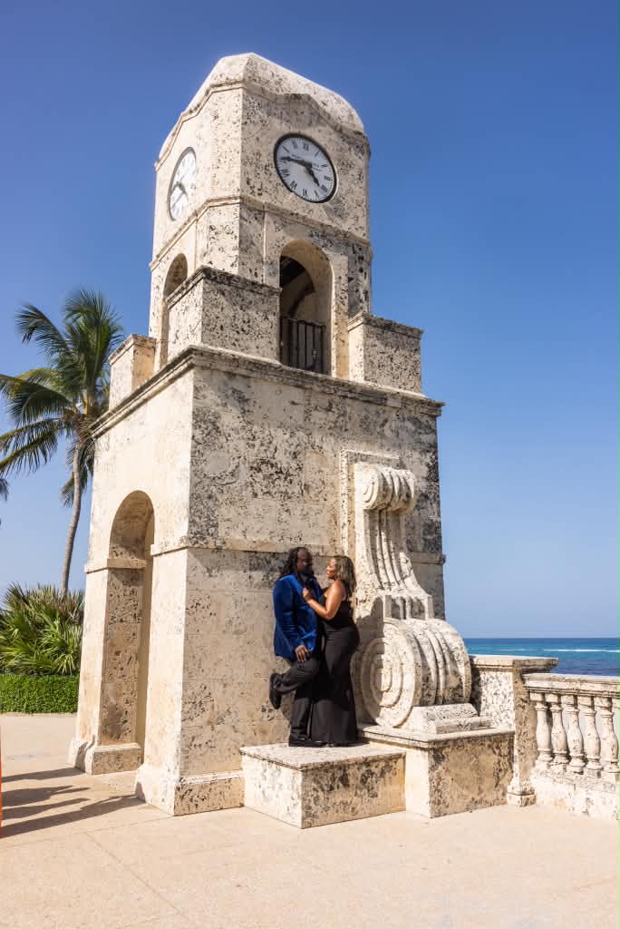 Sharonda and Alfonzo by the seaside clock tower