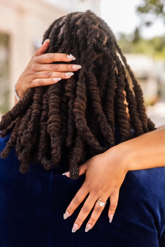 An embrace and the engagement ring