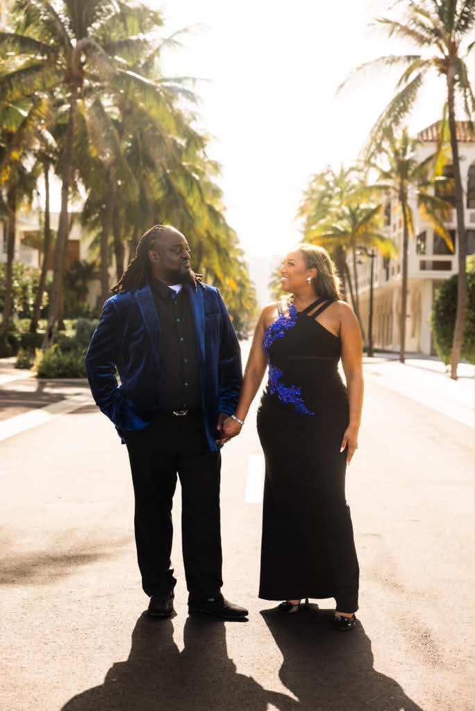 Sharonda and Alfonzo holding hands